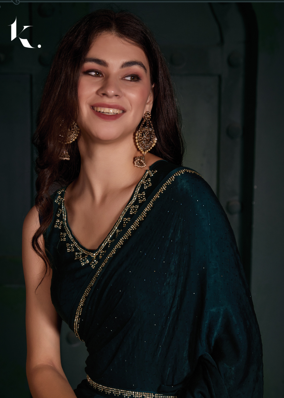 Teal Green Imported Velvet Fabric With Swarovski Work Sprinkled All Over The Body And Handwork Zircon Border Saree